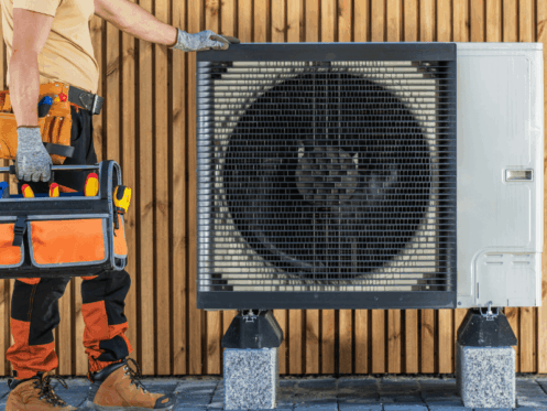 HVAC tech repairing a unit