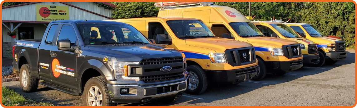 Fleet of company trucks lined up