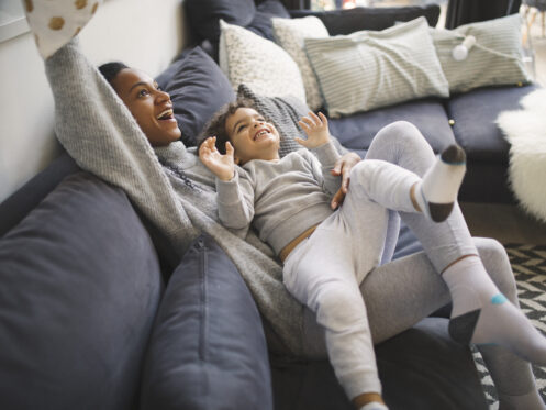 A young mother and son enjoying the comfort of their home